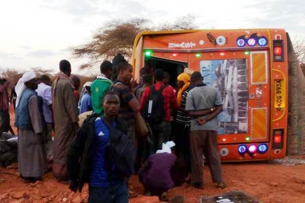 The bus that overturned in Mandera on September 1, 2016 after hitting a heap of soil at a road construction site leaving 10 passengers injured. PHOTO | MANASE OTSIALO | NATION MEDIA GROUP